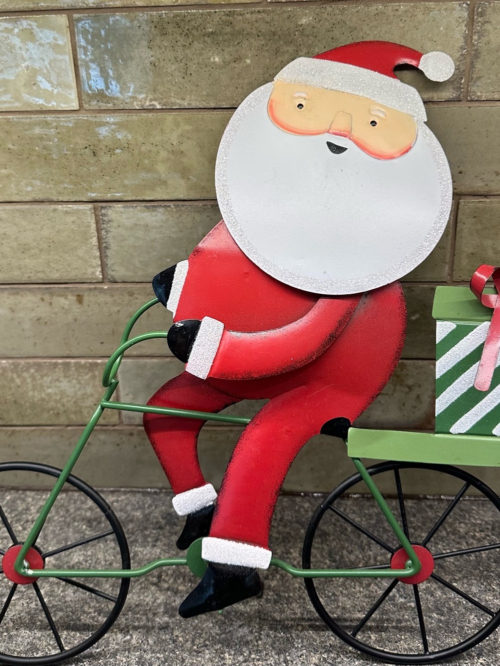 Festive Red Metal Santa on Bicycle Holiday Ornament -